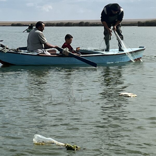 Fishing with net from boat 600x600